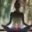 Lady meditation with chakras getting activated and Third Eye active and glowing.