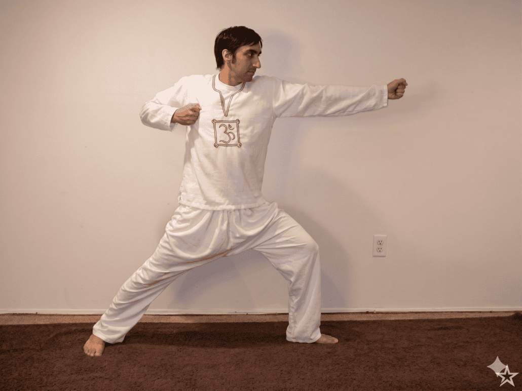 Yoga Master Anmol Mehta demonstrating Kundalini Yoga Archer Pose